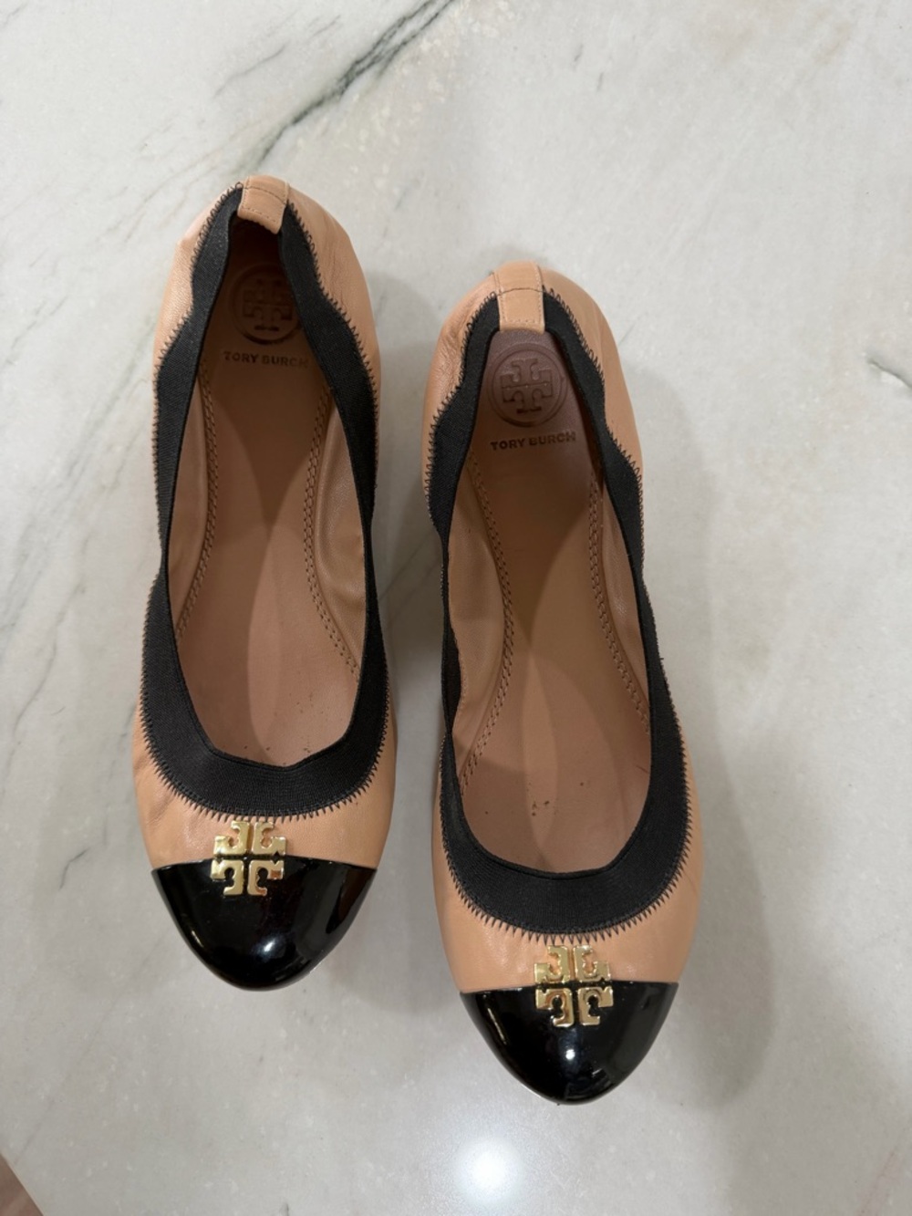 Tory Burch Nude Leather Ballet Flats with Black Patent Cap Toe and Gold Logo